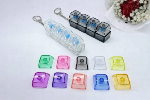 Klawiatura LED breloczek FIDGET 4 PRZYCISKI ŚWIECI KLIKACZ switch CLICKER