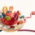 MONTESSORI ABAWKA SENSORYCZNA PRZECIĄGANIEC GRYZAK PULL STRING TOY SZNURKI